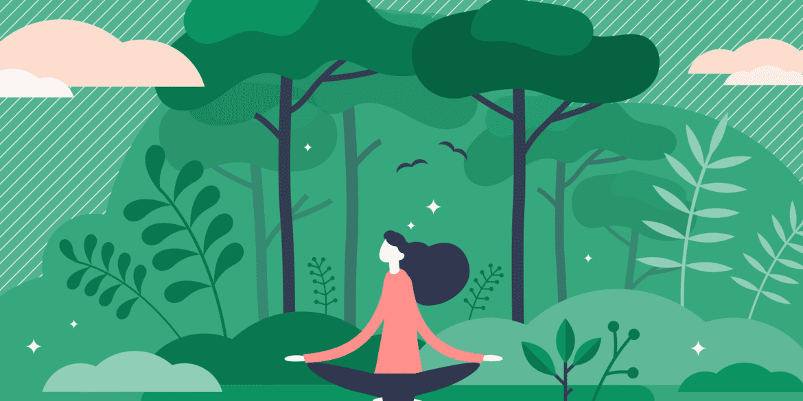 Woman in forest peacefully meditating