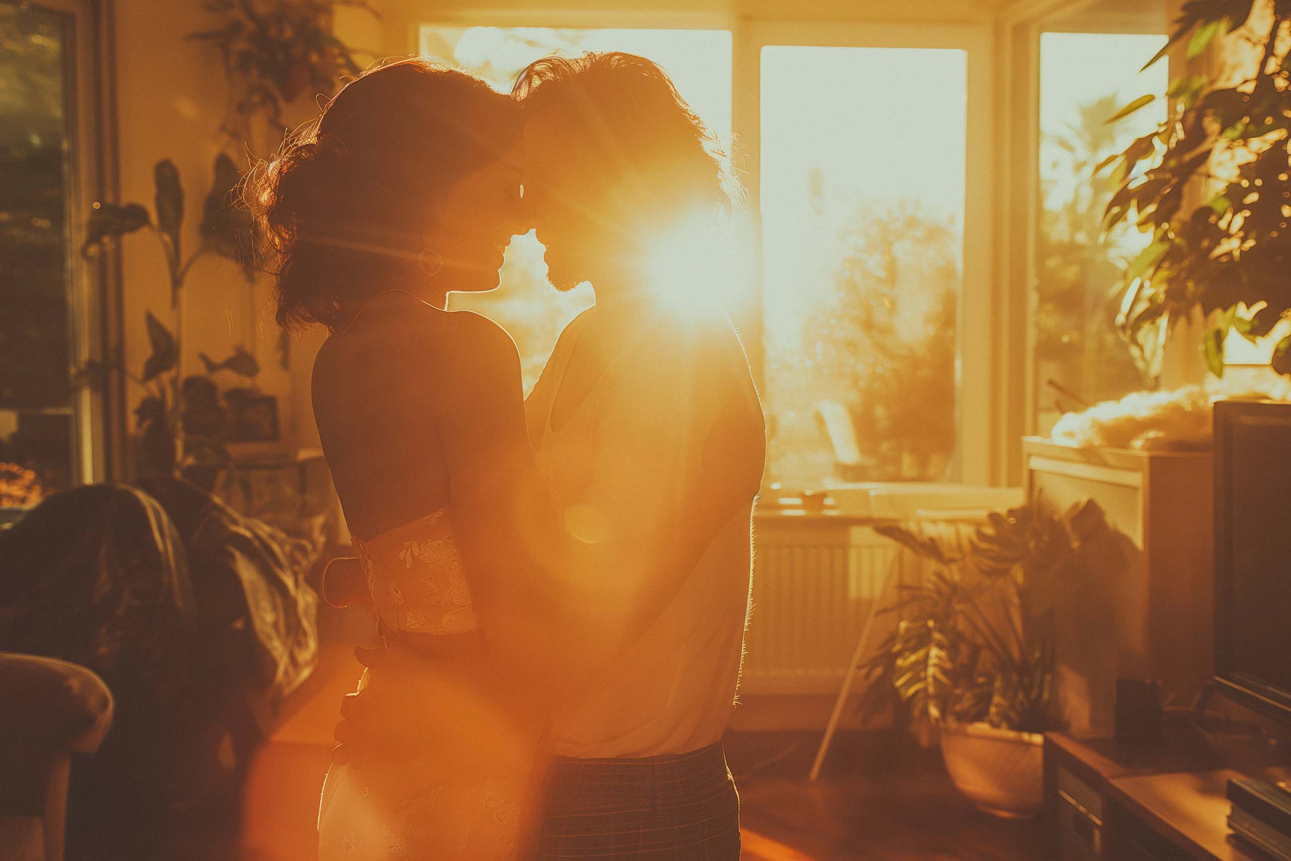 Couple embracing in sunset