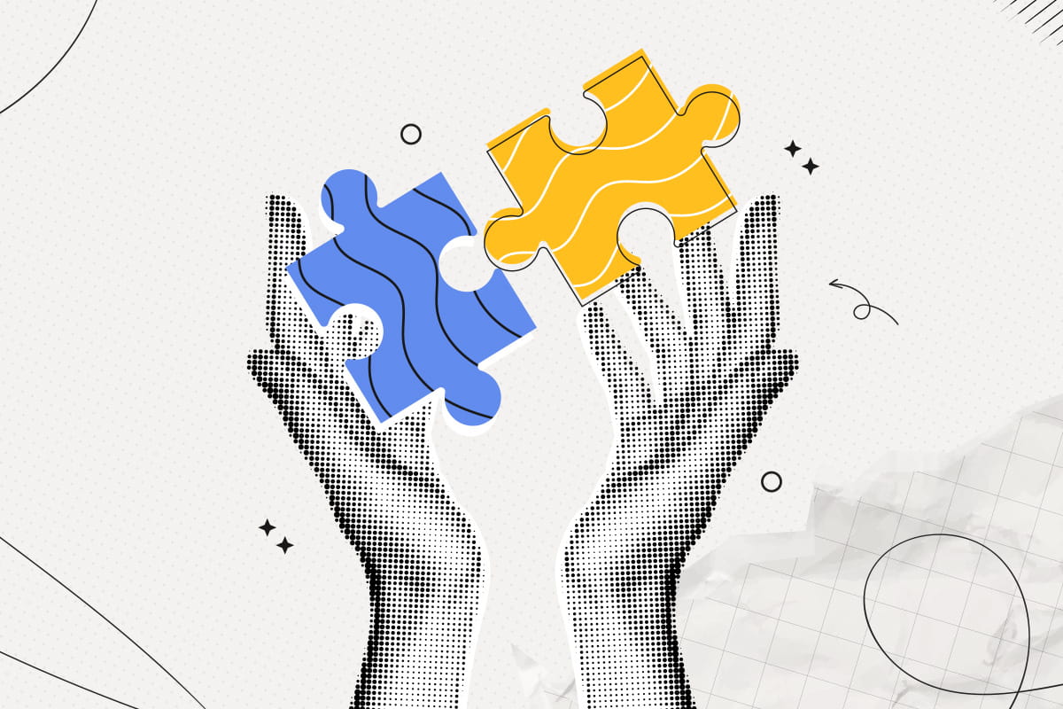 Two hands and two puzzle pieces