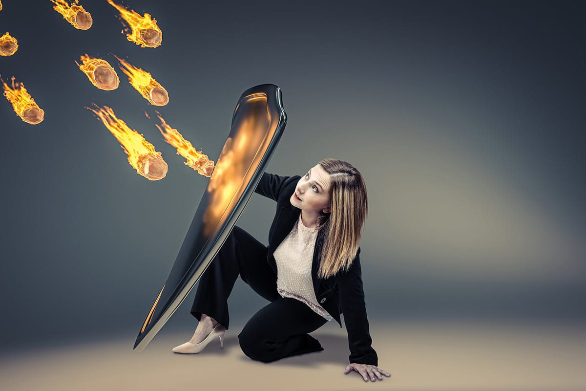 Woman protected with a shield