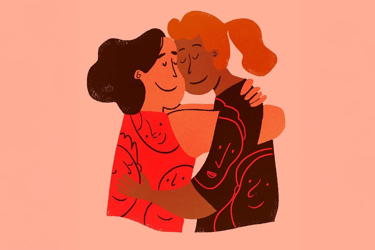 Couple of women hugging
