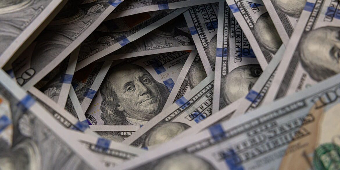 Many hundred dollar bills